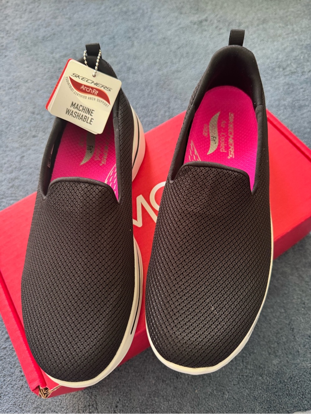 Skechers Women’s Black Slip-On Sneakers with Pink Insole
